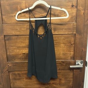 Small black tank with cutouts